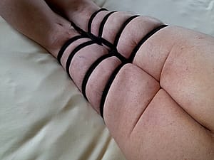 Black rope legs tied'