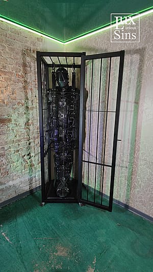 Kept in storage in a leather sleepsack and locked in a cage in the dungeon.'