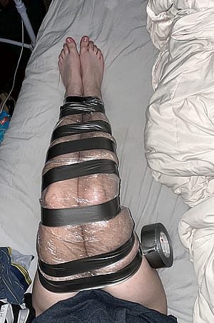 Selfbondage with wrap and tape'