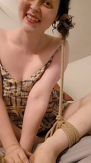 Playful selfbondage. I had a lot of fun setting up this hair rope predicament tie!'